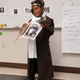 Illustration for article titled 8-Year-Old Girl Dressed Up as Michelle Obama for Cultural Heroes Day and Our Lives Will Never Be the Same Again